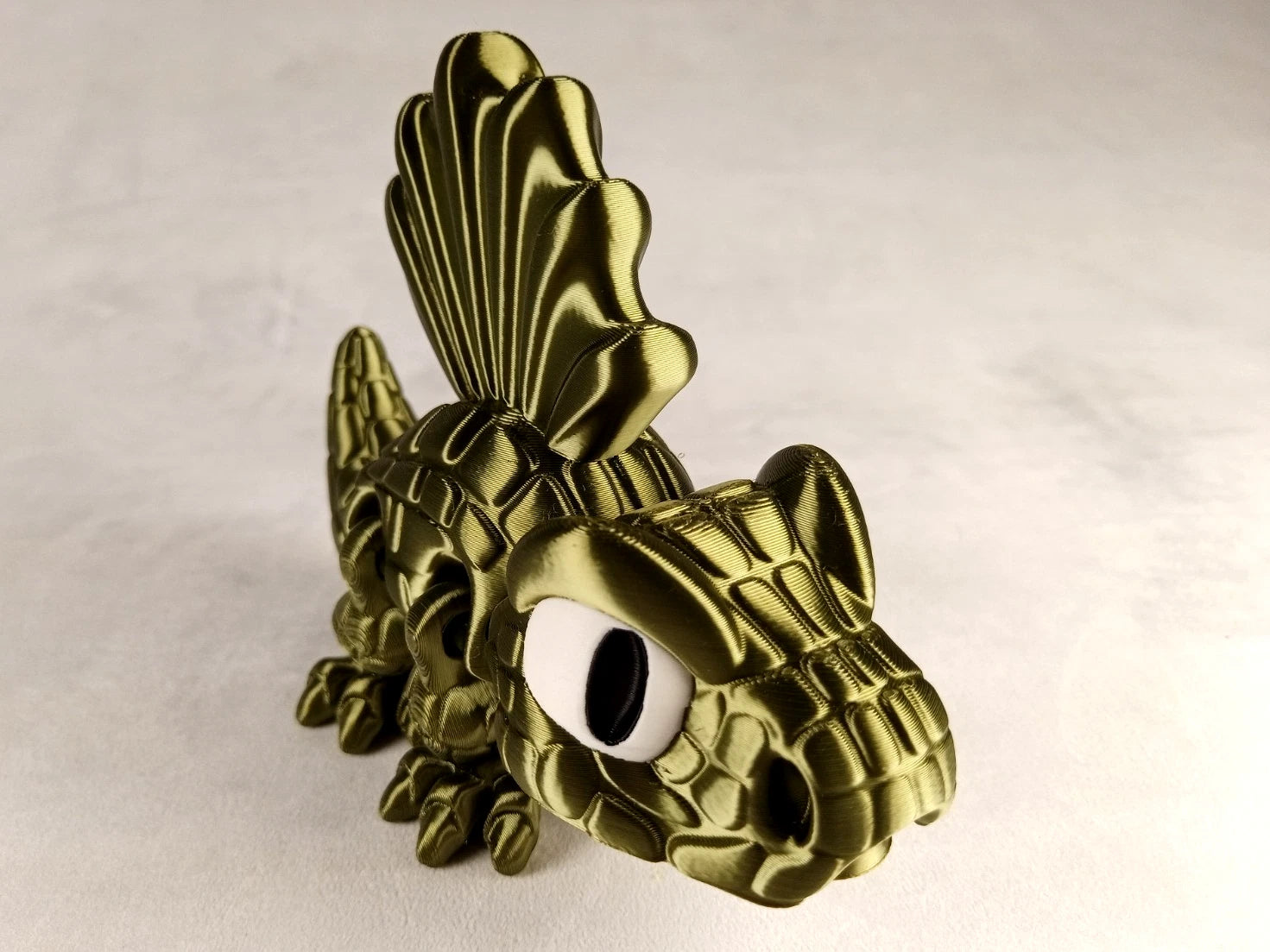 Dimetrodon Flexi Dinosaur, Dinosauro articolato verde seta stampa 3D a colori PLA lunghezza 14 cm.