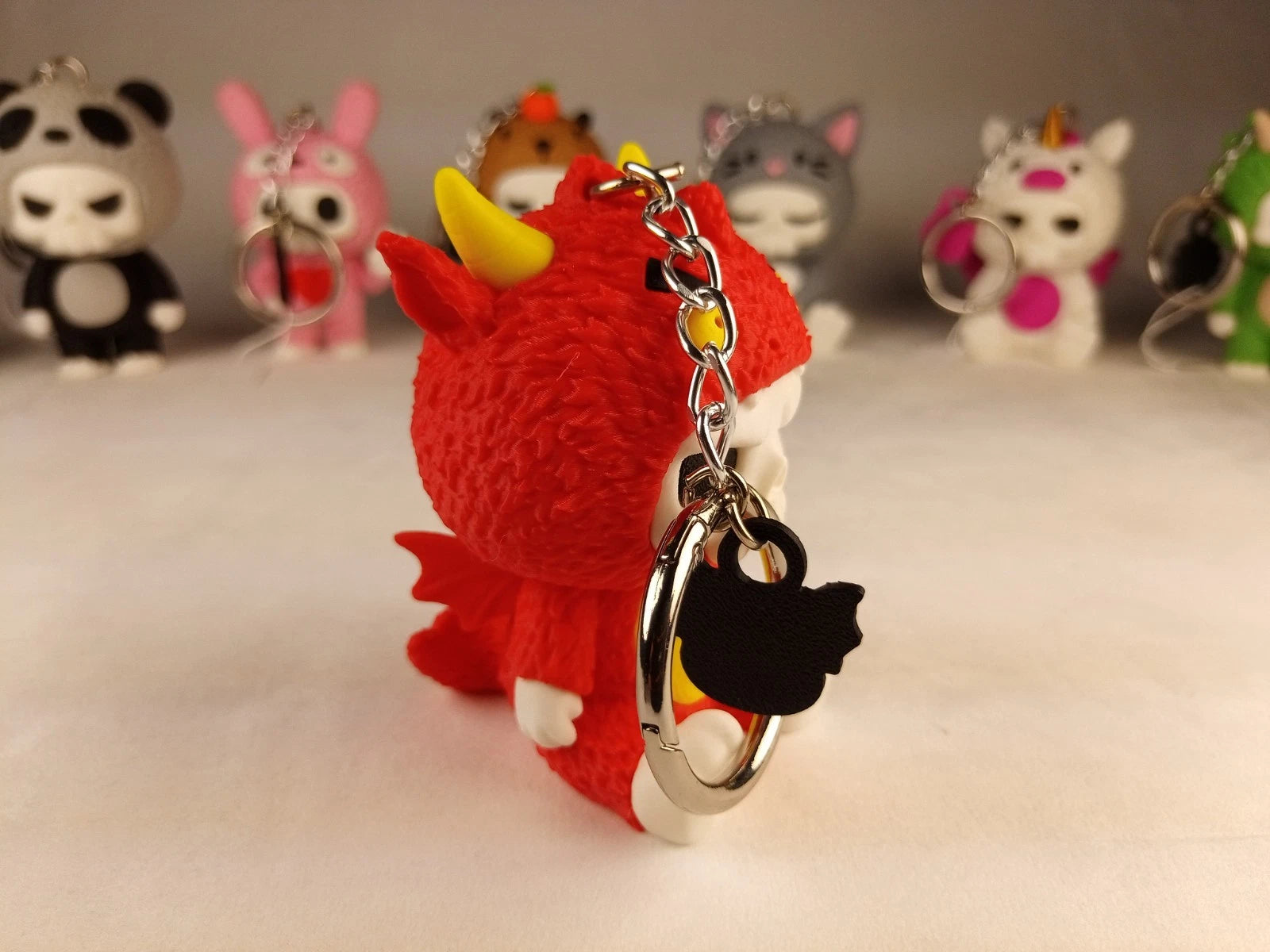 Skubbies "Scorchi" portachiavi, personaggio da collezione Stampa 3D PLA a colori con catena anello con moschettone a molla