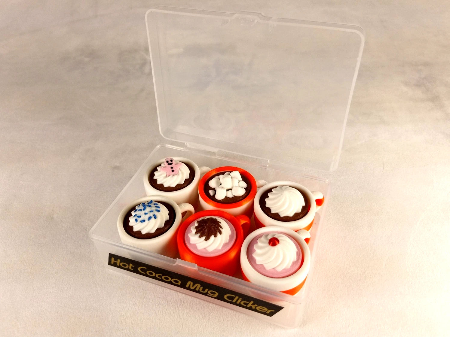 6 Hot Cocoa Mug Clicker Tazzine cliccabili antistress, bianco/arancio realizzate in stampa 3D