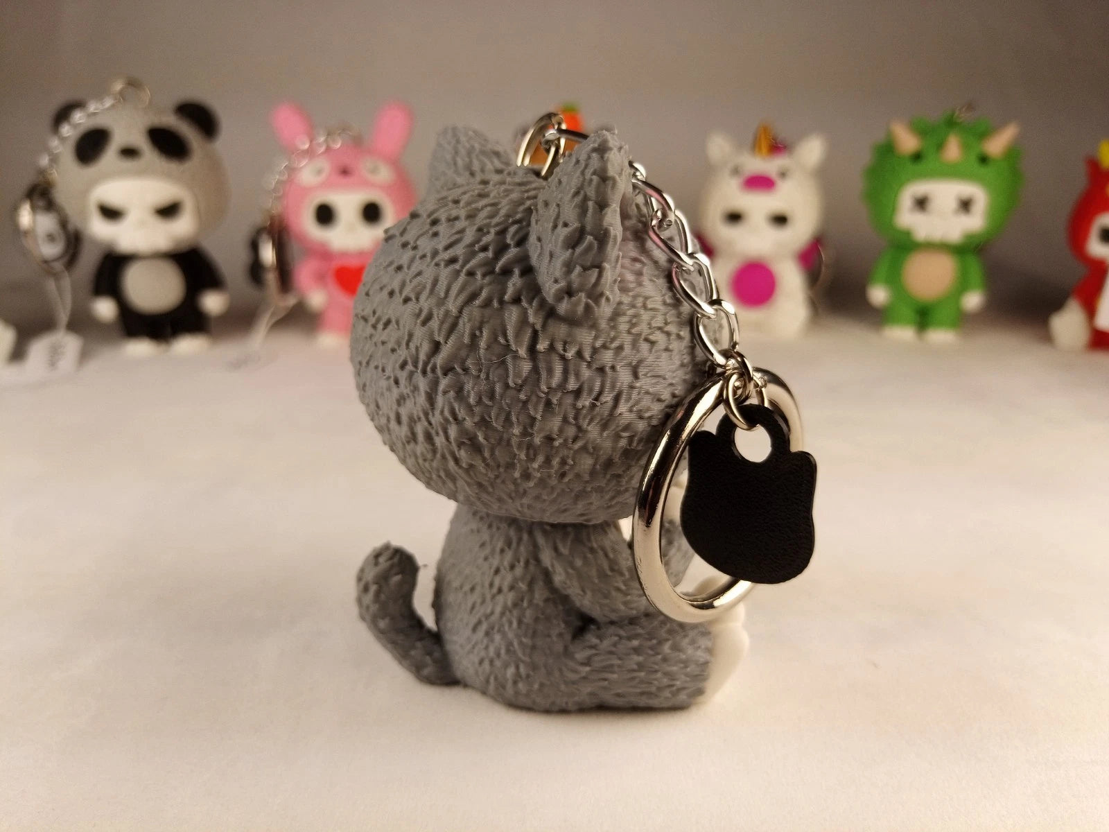 Skubbies "Whispurr" portachiavi, personaggio da collezione Stampa 3D a colori con catena e anello con moschettone a molla