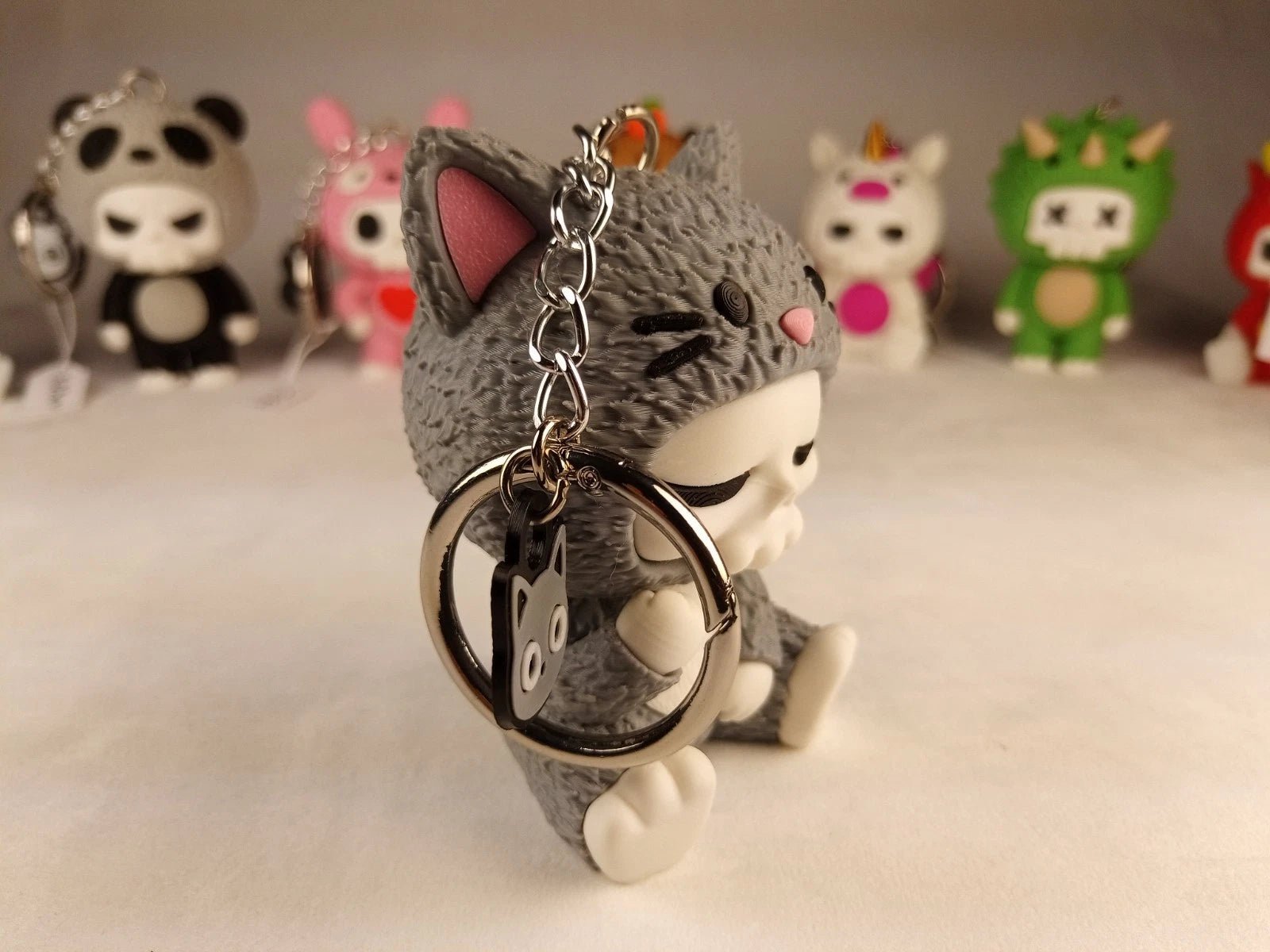 Skubbies "Whispurr" portachiavi, personaggio da collezione Stampa 3D a colori con catena e anello con moschettone a molla