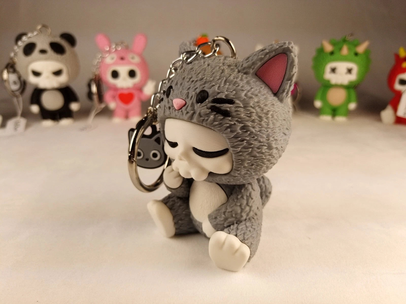 Skubbies "Whispurr" portachiavi, personaggio da collezione Stampa 3D a colori con catena e anello con moschettone a molla